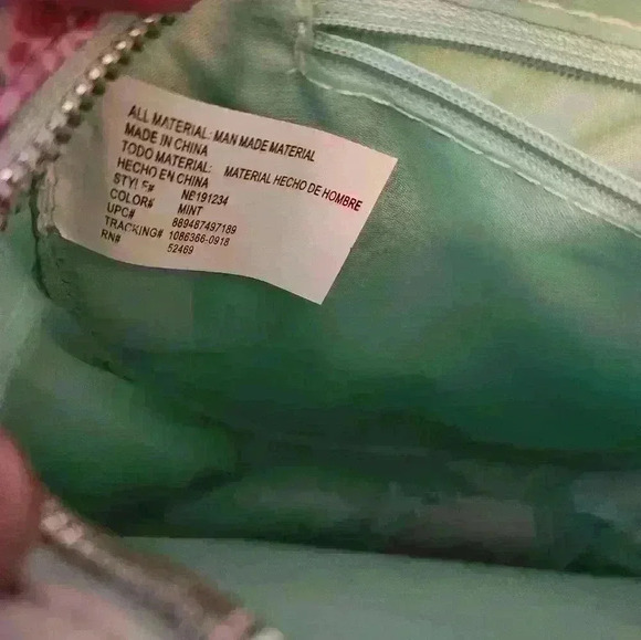 Mint green with detail silk lining.Round Purse with over shoulder and hand strap - Picture 10 of 10